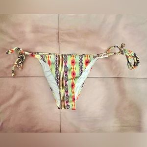 PilyQ Swim string bikini bottoms.